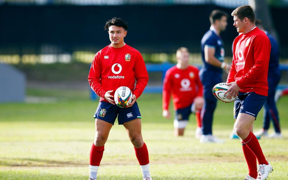 British and Irish Lions' fly-half Marcus Smith and British and Irish Lions' centre Owen Farrell (R) attend a training session at The Hermanus High School on the outskirts of Cape Town on July 20, 2021, ahead of the first Test match against South Africa on July 24. - GETTY IMAGES