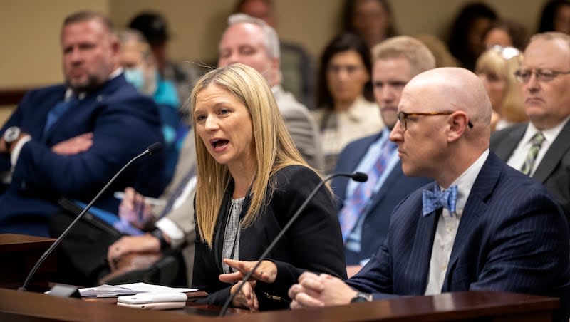 Utah Solicitor General Melissa Holyoak and Daniel Burton, general counsel with the Utah Attorney General's Office, speak during the Legislature's Business and Labor Interim Committee at the Capitol in Salt Lake City on Monday, Oct. 4, 2021.