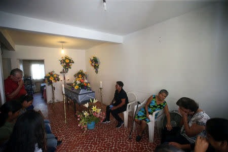 Family members and friends attend the wake of a woman who was killed in the earthquake, in Jojutla de Juarez, Mexico September 21, 2017. REUTERS/Edgard Garrido