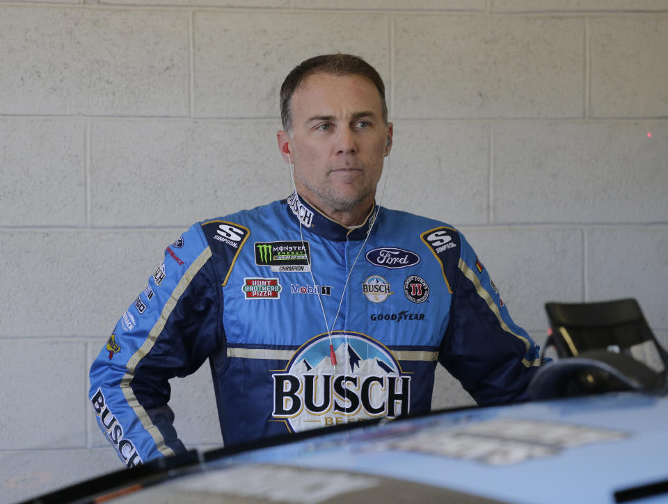 Kevin Harvick stands by his car before practice for a NASCAR Cup Series auto race on Saturday, Nov. 16, 2019, at Homestead-Miami Speedway in Homestead, Fla. Harvick is one of four drivers racing for the championship. (AP Photo/Terry Renna)