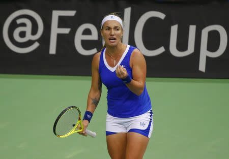 Svetlana Kuznetsova of Russia reacts after losing a point during her Fed Cup World Group tennis match against Kiki Bertens of the Netherlands in Moscow February 7, 2016. REUTERS/Maxim Shemetov