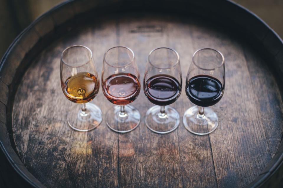 <p>Courtesy of Unsplash | Photo by Maksym Kaharlytskyi</p><p>Wine is like looking into a kaleidoscope, an explosion of visual information that <em>your</em> brain processes in its own unique way. </p><p>One person can look at a red wine in the glass and simply see red.</p><p>Another may see the same red wine dive deeper into the optics. They may see the light reflecting, separating red and orange hues. They may look to the outsider layer, or the meniscus of the wine, and see the rings of Saturn-like developments of color. </p><p>Within white wine, there are so many complexions. With rosé, many tints. Orange / Amber wine can show varying degrees of depth of color. This is also true of red wine. So what does color say about the wine itself?</p><p>It can inform the age of the wine. Intensity of color, especially on the purple to dark red side, can lead you to believe the wine is youthful. A bit of bricking around the outside of the meniscus will show age. If you aren’t familiar with bricking, it’s when a red wine shows a brown or rust-colored transition as it ages. The life cycle of wine shows not just smell and taste development, but color as well! </p><p>I recommend picking up a youthful wine, and trying your best to buy some vintage wine on the auction market as well to truly see the differences color-wise. Winebid.com is a great place to bid on vintage wines for sale at a relatively affordable price, and they can ship to most states in the USA.</p><p>Here are some wine recommendations I have for the sake of color intensity:</p>