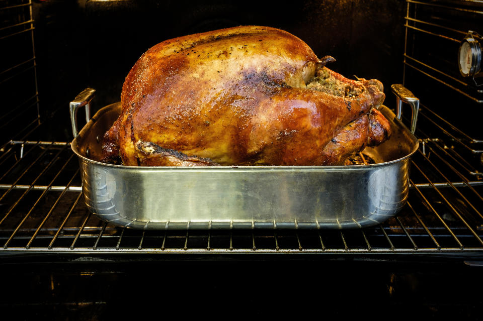 a roasted turkey in an oven