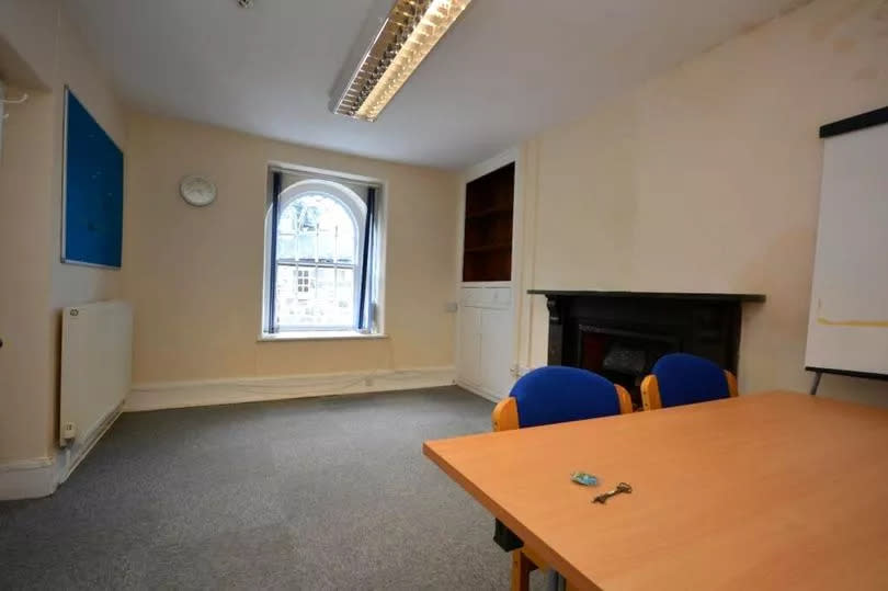 One of the 11 rooms - including two former cells - now used as office space