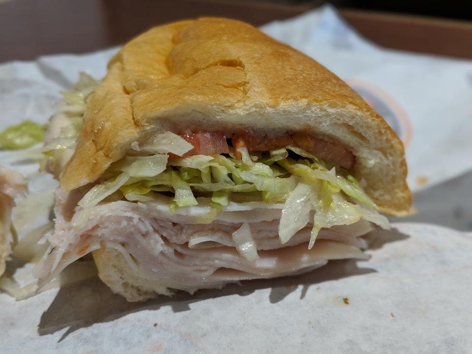 If you grew up on the East Coast like me, you know sub shops. I grew up near one of the first <a href="https://www.capriottis.com/">Capriotti&rsquo;s</a>, and frequented other sub shops in Delaware, Pennsylvania and New Jersey. The meats were always sliced fresh, the rolls were soft, and the sandwiches were so huge you could never eat them in one sitting. But I&rsquo;d never been to Jersey Mike&rsquo;s, which was founded in the &lsquo;50s on the Jersey Shore. I thought it was a gimmick cooked up by a chain to make it sound like an East Coast sub shop. It&rsquo;s not. This is the real deal.<br /><br />When I walked in to order, a huge meat slicer greeted me &mdash; not by speaking, that&rsquo;d be weird. It was just hard to miss. The guy behind the counter took my order (a 5&rdquo; Mini #7 Turkey and Provolone) and began slicing the turkey in front of me. Just for me. I asked for the sub to be dressed Mike&rsquo;s Way, with onions, lettuce, tomato, oregano, salt and a mix of red wine vinegar and oil. <br /><br />I took one bite and was blown away. After that bite, the red wine vinegar and oil covered my fingers. I didn&rsquo;t care to wipe them off because I was too busy eating. The roll was fresh (they bake them every day), there was plenty of fresh turkey packed into a relatively small sub, the veggies popped with flavor and the seasoning enhanced all the ingredients. It reminded me of home. I remembered how good a sub could be. That&rsquo;s a dang good deal for $5.99.