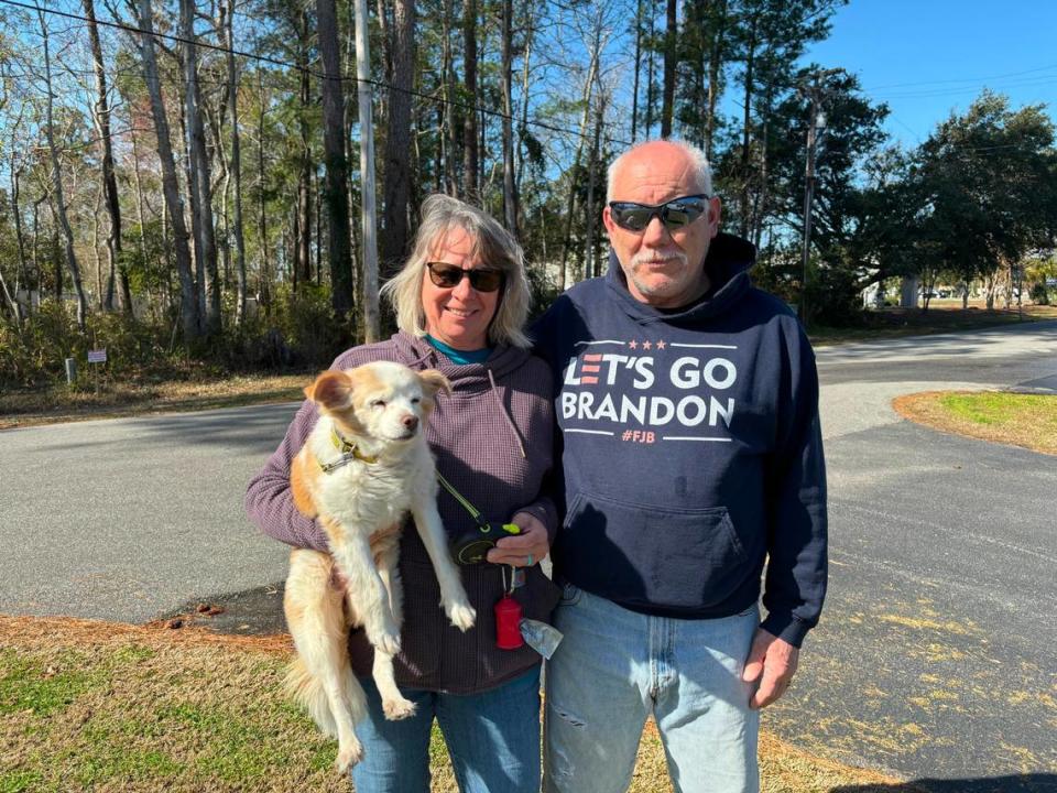 Warren Lilly, right, and Carolyn Lilly, right, with their dog Milly. Warren said he voted for Donald Trump in the GOP primary and wore a Let’s Go Brandon sweatshirt to show his support for the presidential candidate. He had to flip up his sweatshirt in order to vote as people are not allowed to wear political gear into the polls. Emalyn Muzzy