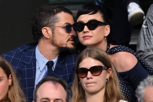 <p>Karwai Tang/WireImage</p> Orlando Bloom and Katy Perry at Wimbledon in 2023