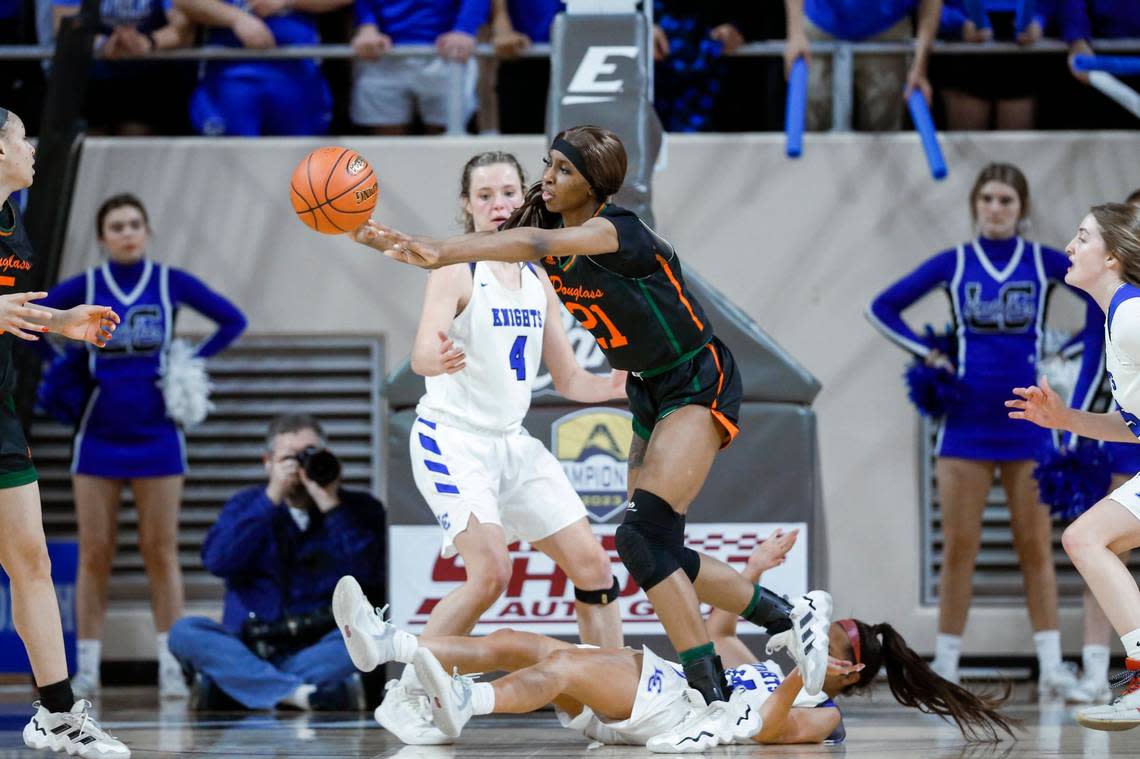 Frederick Douglass’ Ayanna Darrington (21) grabbed 29 rebounds against Lexington Catholic during the 11th Region Tournament championship game Saturday.