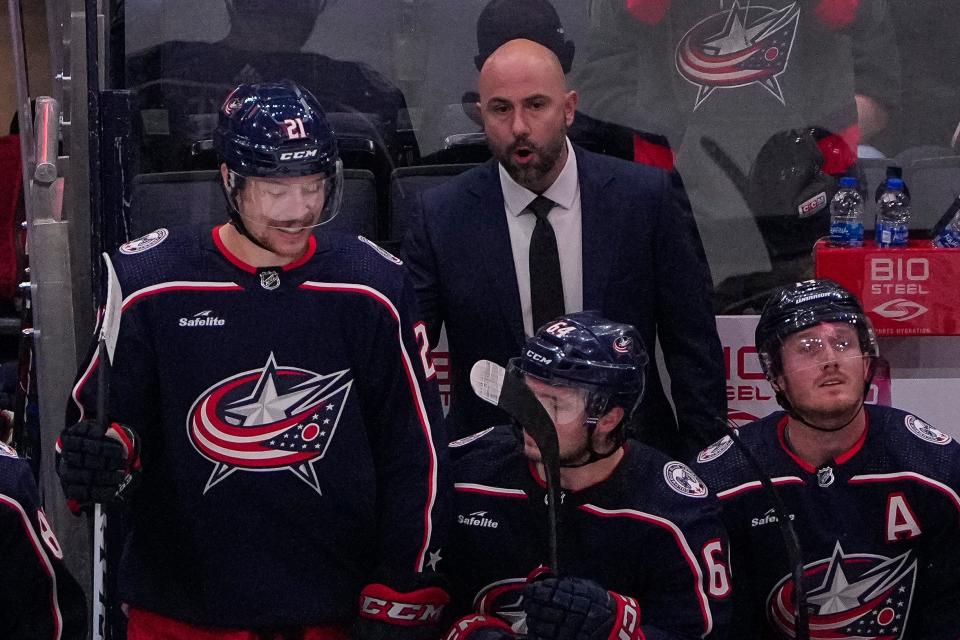 Blue Jackets assistant coach Pascal Vincent talks to center Josh Dunne during the preseason game Sept. 25.