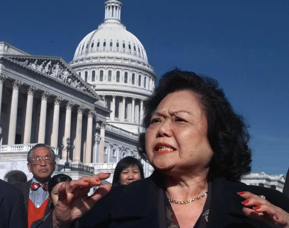 FILE - Rep. Patsy Mink, D-Hawaii, meets reporters on Capitol Hill Wednesday Nov. 5, 1997, to call on the Senate Judiciary Committee to support Bill Lann Lee's nomination to head the Justice Department's civil rights division. The arrival of Title IX and its protections for American women was a long time coming and the result of hard work from the likes of Jeannette Rankin, Shirley Chisholm, Eleanor Roosevelt, Patsy Mink and more.(AP Photo/Joe Marquette, File)