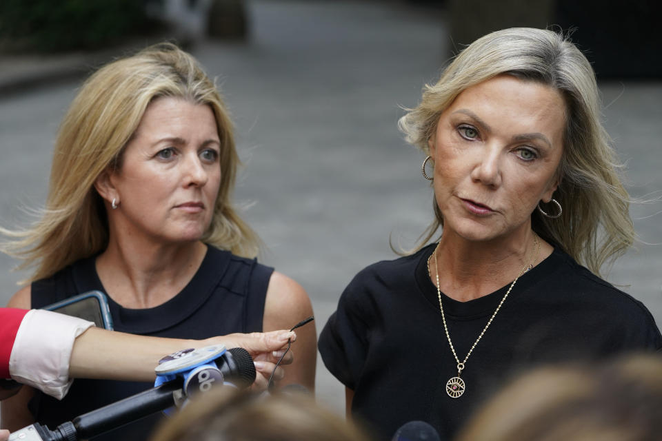 Sexual assault survivors Amy Yoney, right, and Laurie Kanyok, left, speak to members of the media during a break in sentencing proceedings for convicted sex offender Robert Hadden outside Federal Court, Monday, July 24, 2023, in New York. The former obstetrician was convicted of sexually abusing multiple patients over several decades. (AP Photo/John Minchillo)