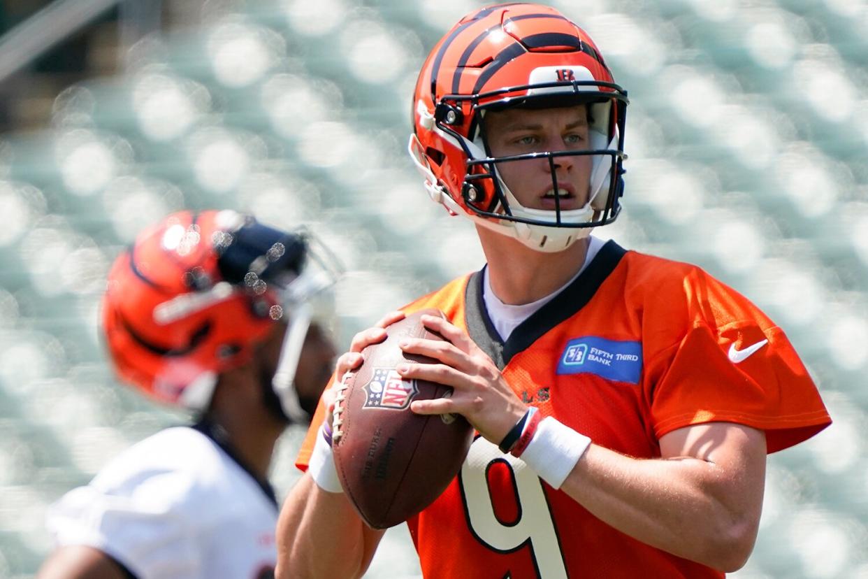 Cincinnati Bengals quarterback Joe Burrow (9) takes part in drills at Paul Brown Stadium Tuesday, June 14, 2022 in Cincinnati.