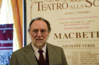 Italian conductor Riccardo Chailly poses for photographers prior to the start of a news conference to present Giuseppe Verdi's 'Macbeth', who will open the opera season at the La Scala opera house next, Dec. 7, in Milan, Italy, Monday, Nov. 29, 2021. (AP Photo/Luca Bruno)