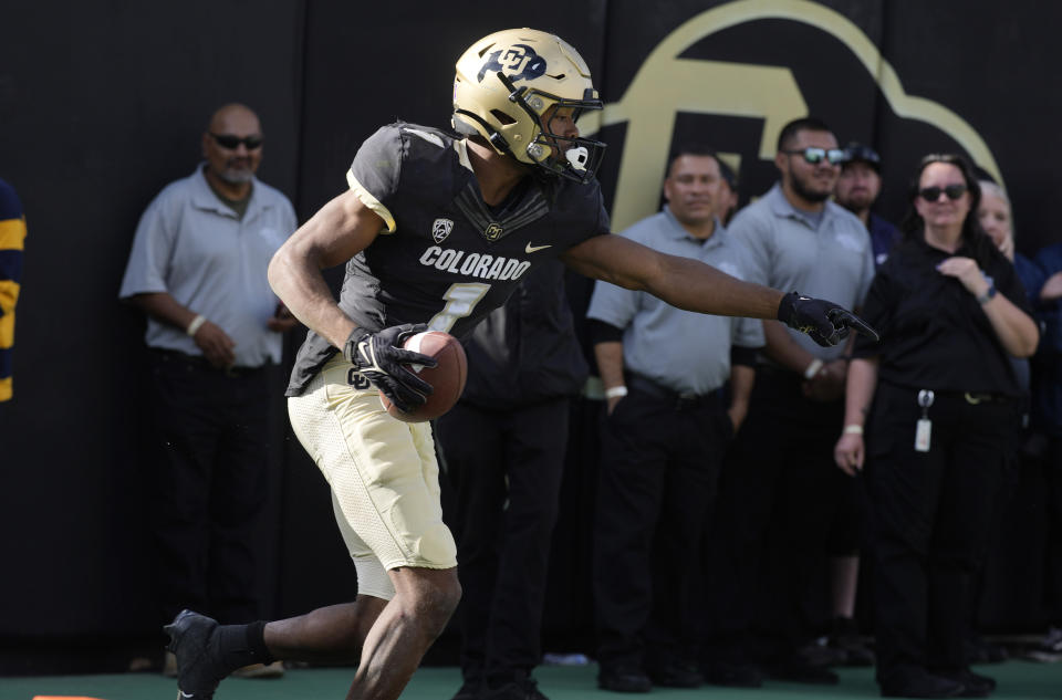 Colorado wide receiver Montana Lemonious-Craig celebrates adfter his touchdown catch in overtime of an NCAA college football game against California at Folsom Field, Saturday, Oct. 15, 2022, in Boulder, Colo. (AP Photo/David Zalubowski)