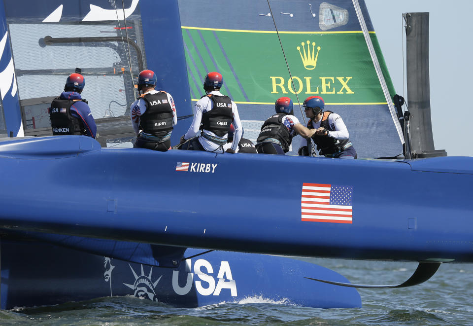 The U.S. team F50 foiling catamaran trains after its launch Monday, April 22, 2019, in San Francisco. New global sports league SailGP launched the first of six F50 race boats into San Francisco Bay that will compete May 4-5. The 50-foot long catamaran is capable of hitting speeds of 60 miles per hour. (AP Photo/Eric Risberg)