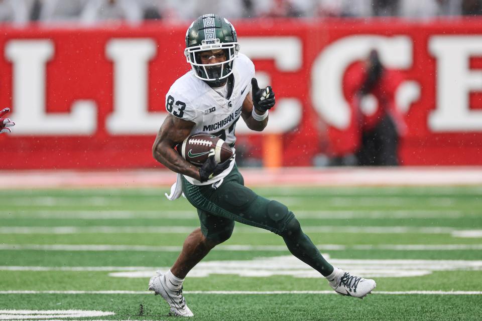 Michigan State Spartans wide receiver Montorie Foster Jr. gains yards after a catch during the second half against the Rutgers Scarlet Knights at SHI Stadium on October 14, 2023 in Piscataway, New Jersey.