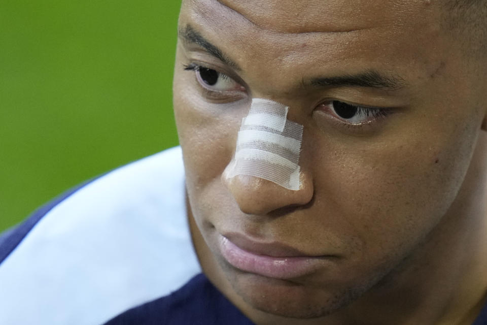 France's Kylian Mbappe gestures as he leaves the field after a training session in Paderborn, Germany, Wednesday, June 19, 2024. France will play against Netherland during their Group D soccer match at the Euro 2024 soccer tournament on June 21. (AP Photo/Hassan Ammar)