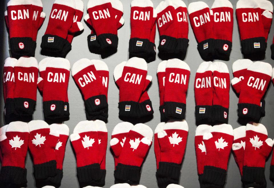 Mittens are pictured during the unveiling of the Canadian Olympic and Paralympic team clothing in Toronto, October 30, 2013. REUTERS/Mark Blinch (CANADA - Tags: SPORT OLYMPICS)