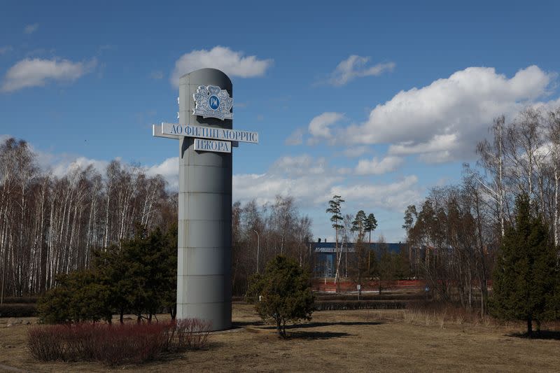 The company's logo is seen near the Philip Morris Izhora factory outside Saint Petersburg