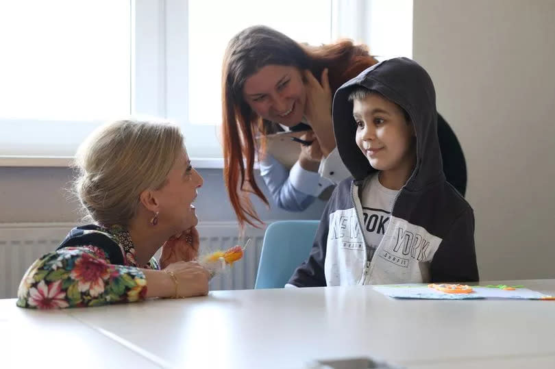 sophie with child in Ukraine