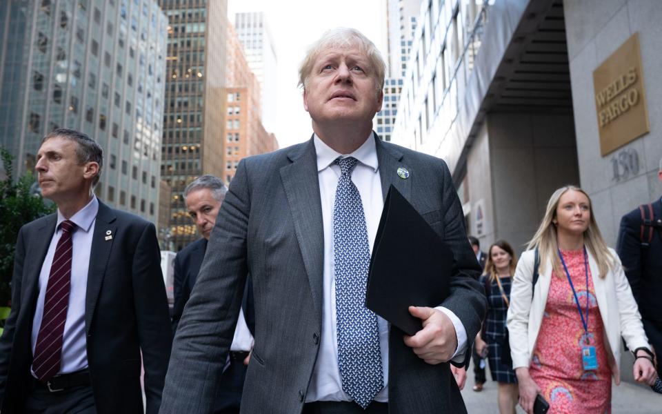 Prime Minister Boris Johnson walks to a television interview in New York whilst attending the United Nations General Assembly. - Stefan Rousseau /PA