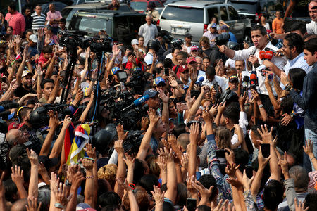 Venezuelan opposition leader Juan Guaido, who many nations have recognized as the country's rightful interim ruler, speaks during a protest against Venezuelan President Nicolas Maduro's government in Caracas, Venezuela, April 10, 2019. REUTERS/Ivan Alvarado