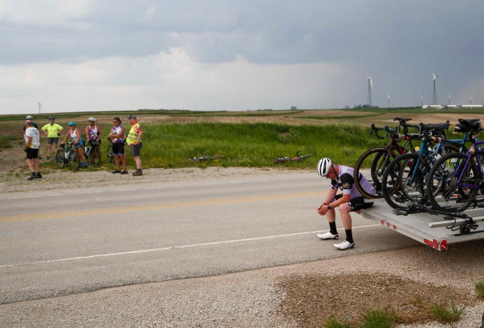 With a thunderstorm threatening, the RAGBRAI route inspection team cuts off its ride 8 miles short of Storm Lake on Sunday and loads bikes into a SAG wagon.