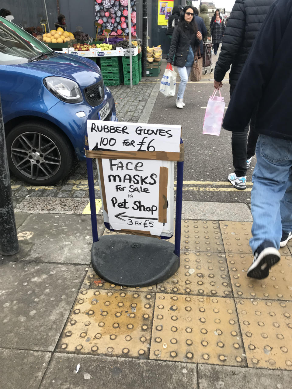 A advertising the sale of face maska dn rubber gloves in London as NHS England announced that the coronavirus death toll had reached 137 in the UK.