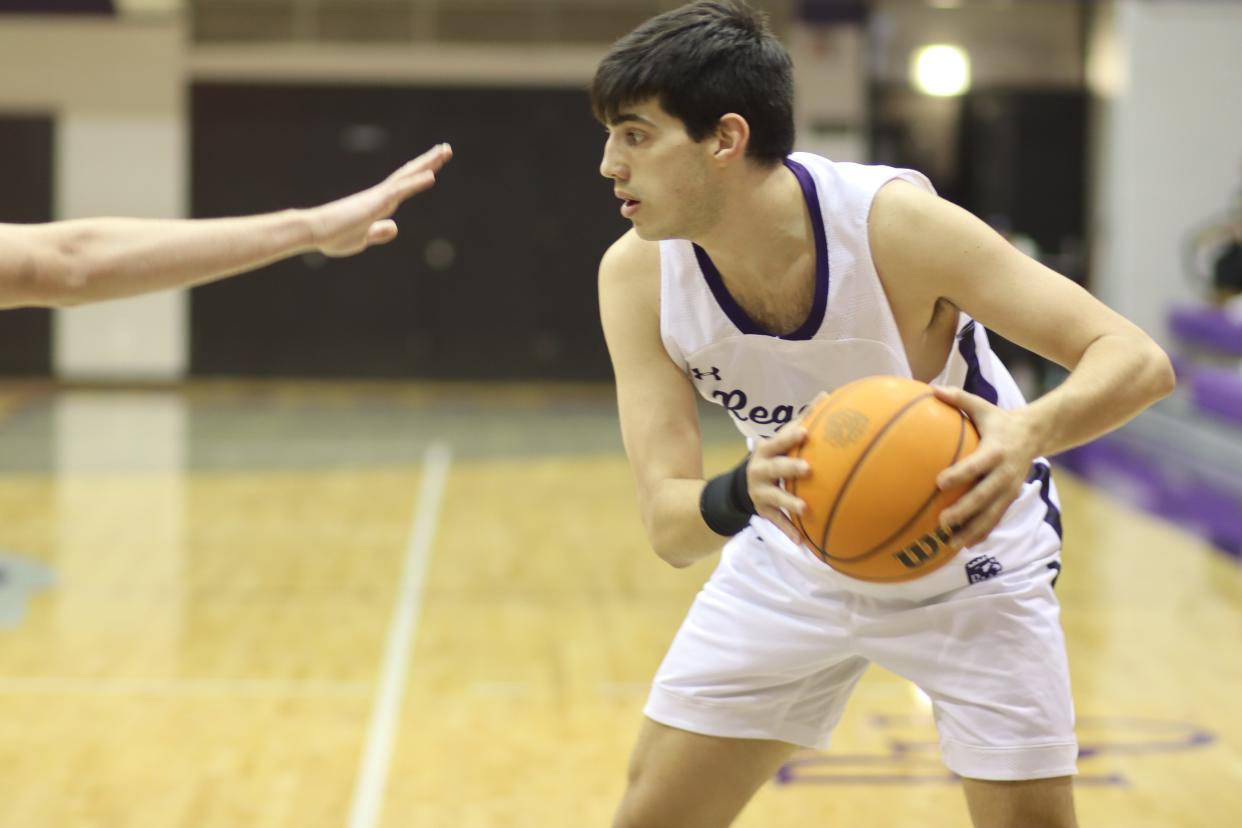 Former Boylan star Kevin Diemer, shown looking to make a pass during a game on Jan. 24, 2022, in Rockford, just recently scored his 1,000th point for Rockford University.