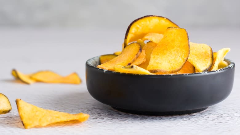 Bowl of homemade potato chips.