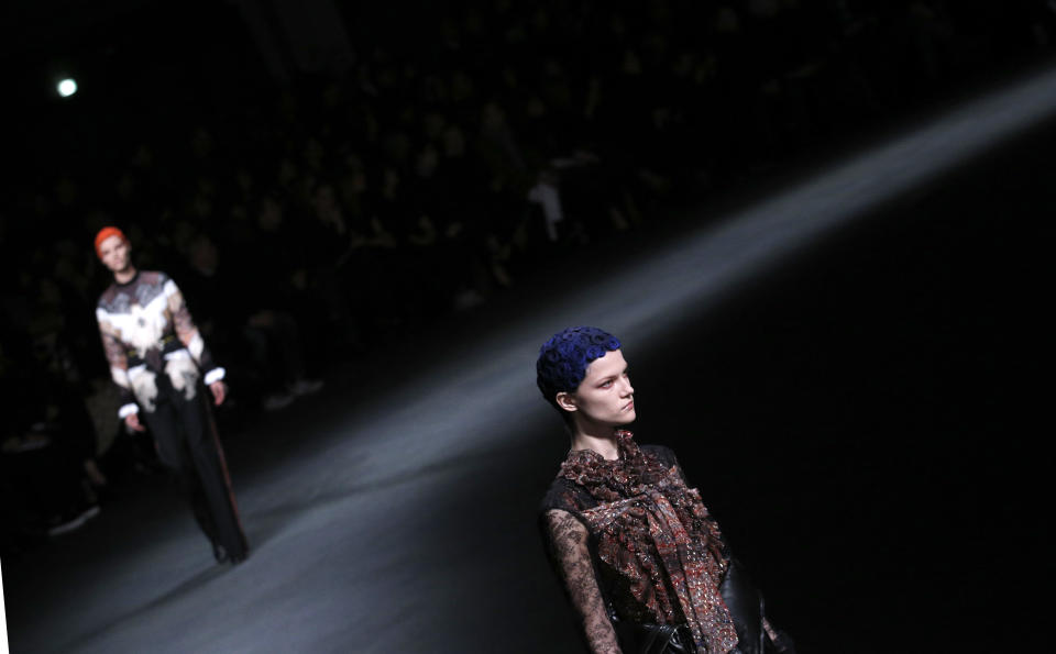 Models wear creations by designer Riccardo Tisci for Givenchy as part of his Fall/Winter 2013-2014 ready to wear collection, in Paris, Sunday, March, 3, 2013. (AP Photo/Christophe Ena)