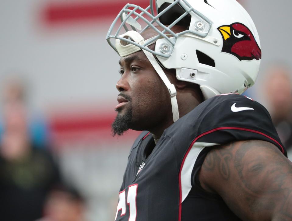 Oct 10, 2021; Glendale, Arizona, USA; Arizona Cardinals center Rodney Hudson (61) warms up before playing against the San Francisco 49ers at State Farm Stadium.