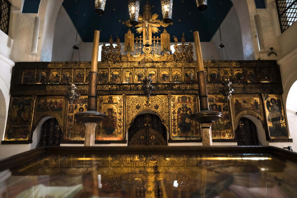 In this Wednesday, April 8, 2020 photo, the Old Orthodox Church in Sarajevo, Bosnia, is deserted due to the national lockdown the authorities have imposed attempting to limit the spread of the new coronavirus. Sarajevo, a religious melting pot throughout its more than five-centuries-long history, would normally be teeming with life this April. Instead, along with the rest of Bosnia and most of the world, it is under a lockdown to try to bring the new coronavirus under control. (AP Photo/Kemal Softic)