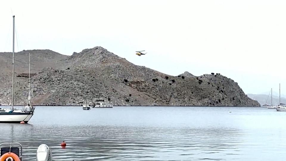 A view of a helicopter taking part in search operations for British broadcaster Michael Mosley (via REUTERS)