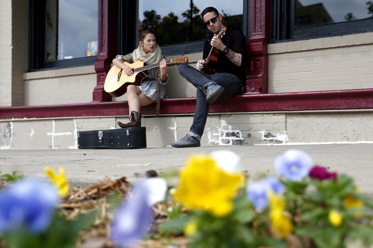Springfield native actor Cailee Spaeny is in the Feb. 2018 issue of Vanity Fair for an upcoming Hollywood movie, "Pacific Rim 2." Here Spaeny strums the guitar and sings with Doug Braudway as he plays the ukulele in downtown Springfield on Oct. 5, 2015.