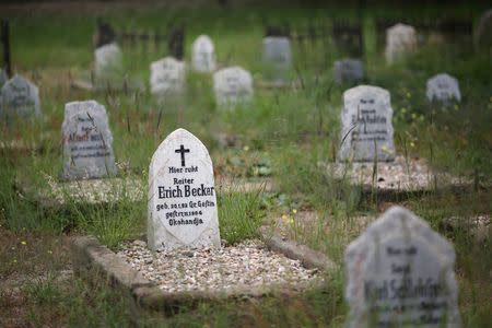 Graves are seen at a cemetery where German soldiers are buried, in Okahandja, north of Windhoek, Namibia, February 21, 2017. Picture taken February 21, 2017. REUTERS/Siphiwe Sibeko