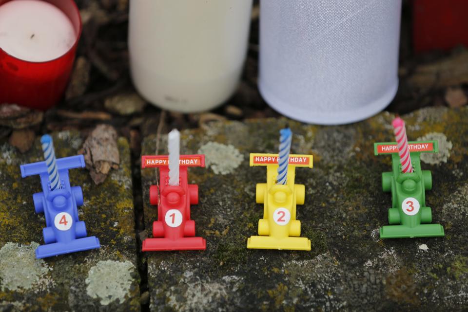 Candles marking the 45th birthday of seven-times former Formula One world champion Michael Schumacher are placed outside his cart racing track, in the western city of Kerpen, Germany, January 3, 2014. REUTERS/Ina Fassbender