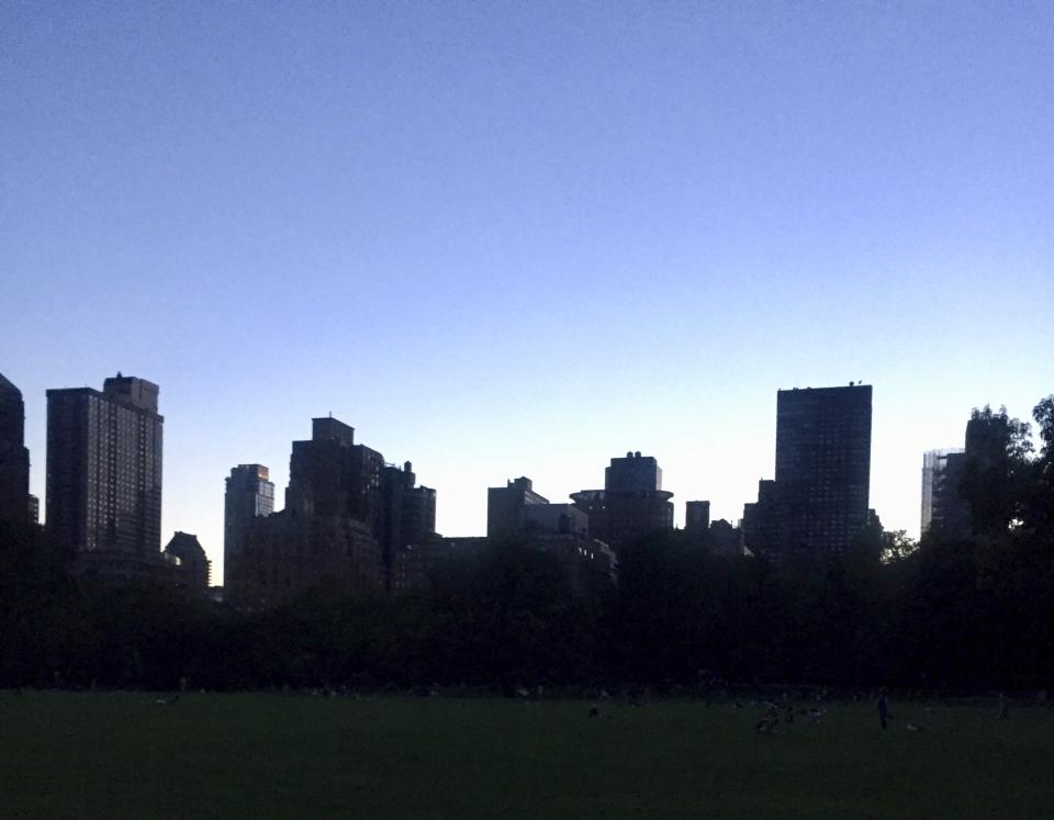 The Upper West Side of the Manhattan borough of New York is dark after a transformer fire caused a power outage and left businesses without electricity, elevators stuck and subway cars stalled. (Alan Reeves via AP)