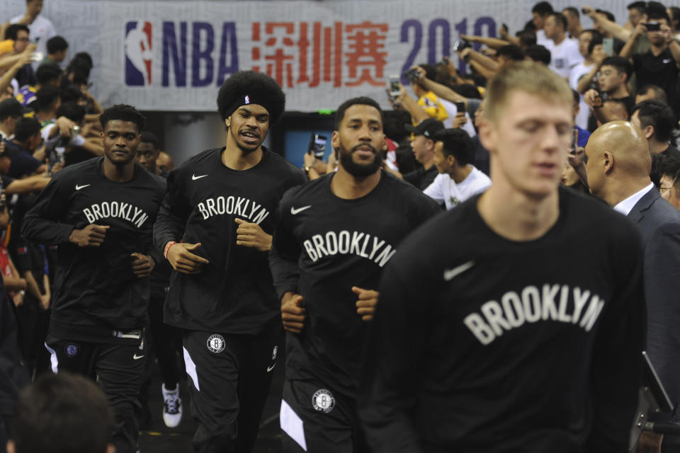 Brooklyn Nets' players arrive for a match against Los Angeles Lakers at the NBA China Games 2019 in Shenzhen in south China's Guangdong province on Saturday, Oct. 12, 2019. (Color China Photo via AP)
