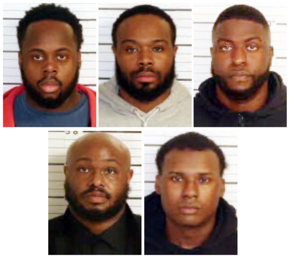 Booking images provided by the Shelby County Sheriff's Office shows, from top row from left, Tadarrius Bean, Demetrius Haley, Emmitt Martin III, bottom row from left, Desmond Mills, Jr. and Justin Smith (AP)