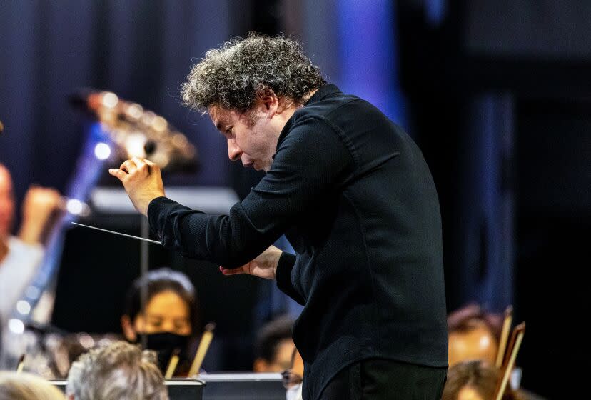 LOS ANGELES, CA - AUGUST 12, 2021: Conductor Gustavo Dudamel conducts the LA Philharmonic at Hollywood Bowl on August 12, 2021 in Los Angeles, California.(Gina Ferazzi / Los Angeles Times)