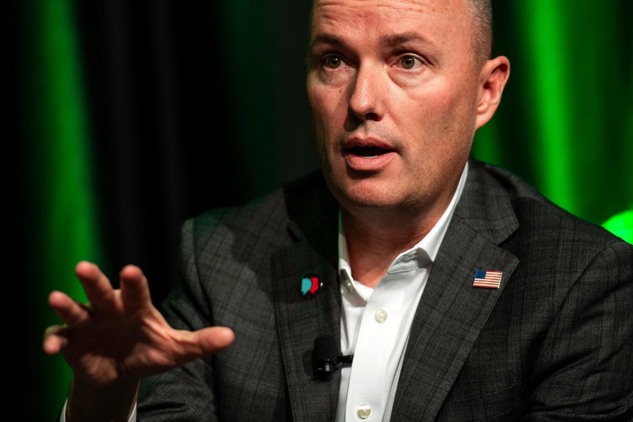 Governor Spencer Cox of Utah answers a question during a discussion, moderated by CSU President Amy Parsons, about how our society can learn to disagree in a way that allows us to find solutions and solve problems at Colorado State University in Fort Collins, Colo., on Wednesday, Nov. 15, 2023.