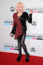 <b>Worst dressed: Cyndi Lauper<br></b><br>The Time After Time singer looked messy on the red carpet in this rock chick style ensemble, complete with ripped tights and tartan scarf.