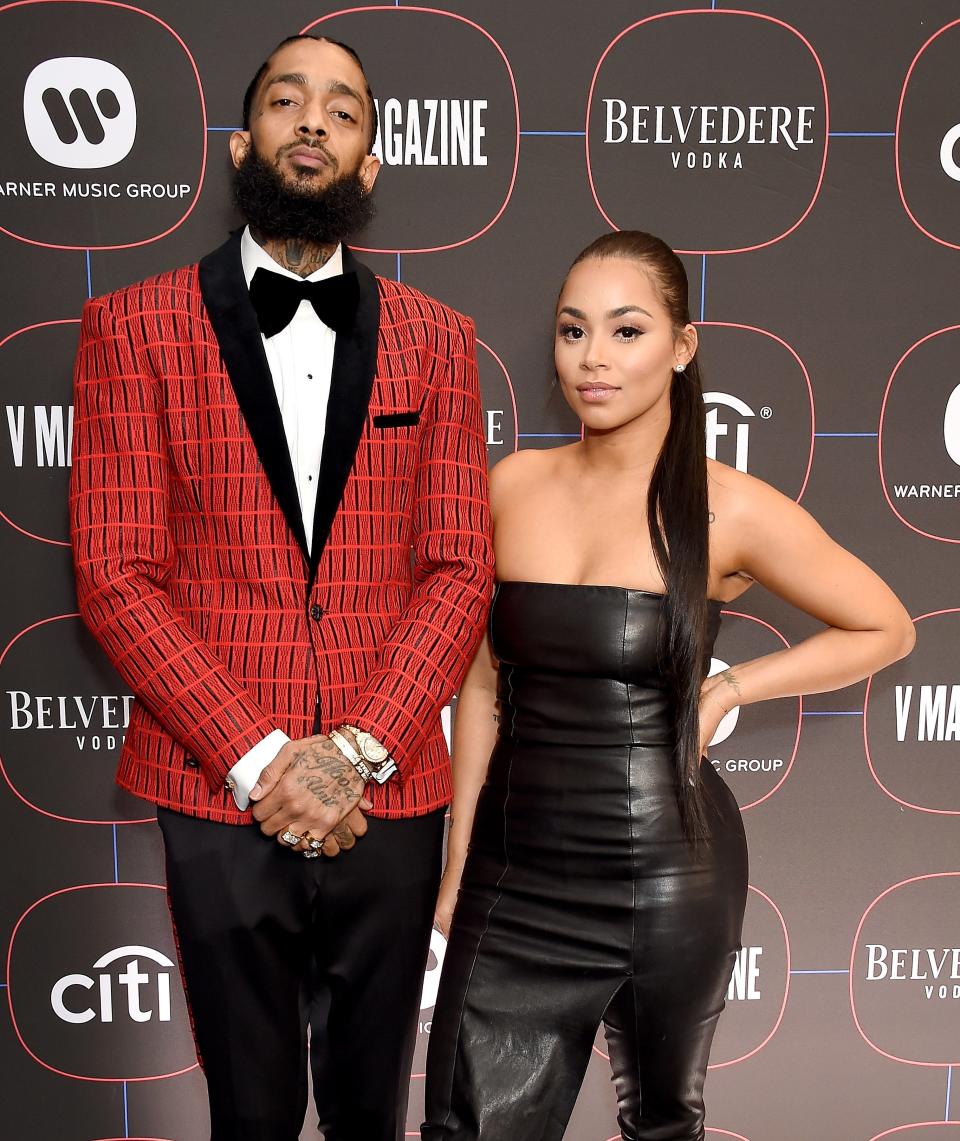 Nipsey Hussle and Lauren London arrive at the Warner Music Group Pre-Grammy Celebration on February 7, 2019 in Los Angeles.