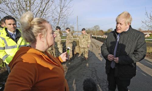 Boris Johnson talks to a woman