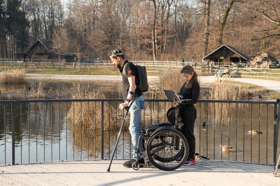 Gert-Jan Oskam walking with the help of a brain and spinal stimulator.