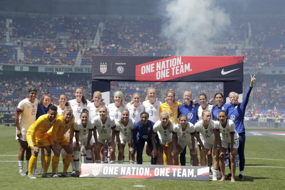 Members of the United States women's national team which is headed to the FIFA Women's World Cup, gather for fans during a send-off ceremony following an international friendly soccer match against Mexico, Sunday, May 26, 2019, in Harrison, N.J. (AP Photo/Julio Cortez)