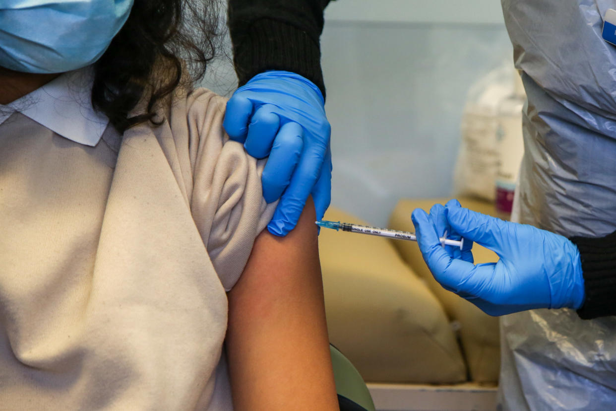 Millions of Britons can now book a COVID booster vaccine. (Getty)