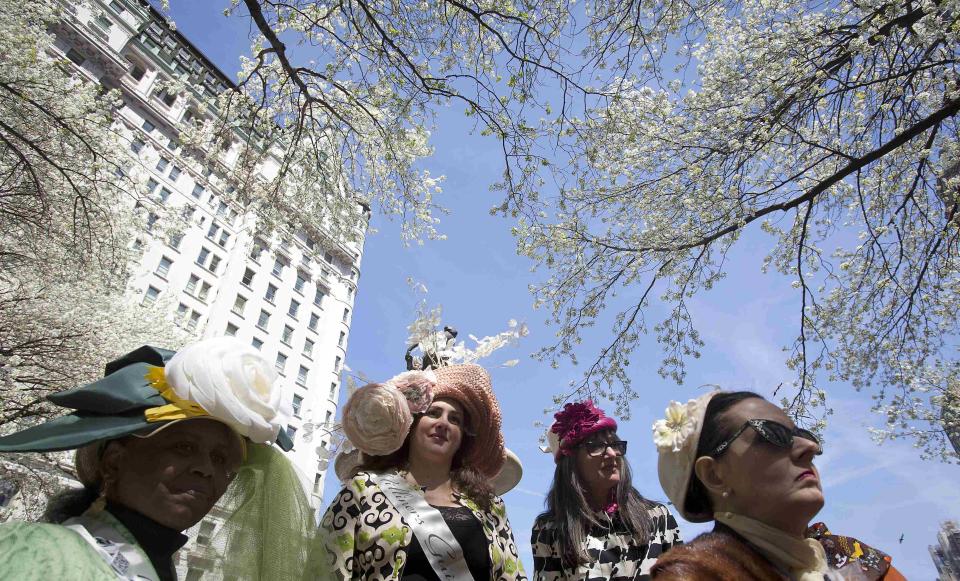 Women attend the annual Easter Bonnet Parade in New York