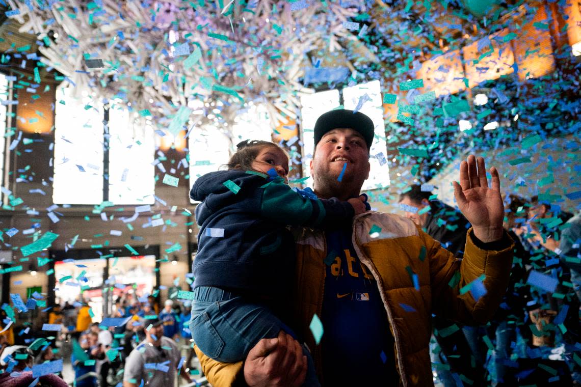 Confetti falls down as fans enter the park before the opening day game between the Boston Red Sox and Seattle Mariners at T-Mobile Park, on Thursday, March 28, 2024, in Seattle, Wash. Brian Hayes/bhayes@thenewstribune.com